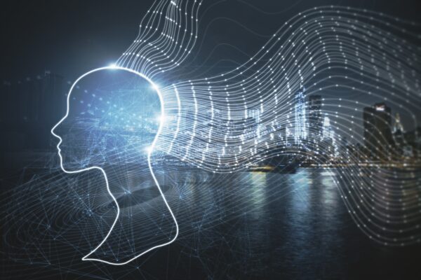 Creative digital head outline on blurry night city.