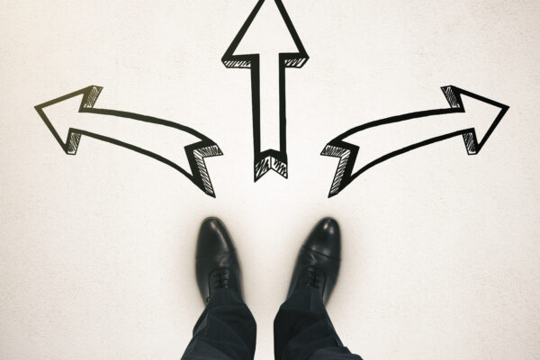 Different direction-concept with businessman.